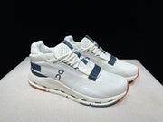 On Cloudnova 2 Sneakers in Ivory and Olive