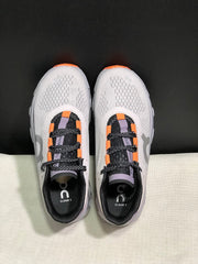 On Cloudmonster Sneakers in Foggy White and Orange