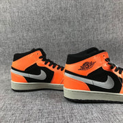 Air Jordan 1 Mid Sneakers Black Orange 554724-062