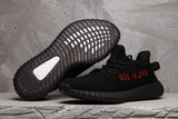 Yeezy Boost 350 V2 Black Knit Sneakers with Red Accents