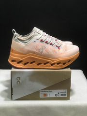 On Cloudsurfer Max Running Shoes in Pearl and Tangerine