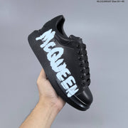 Alexander McQueen Oversized Sole Sneakers with Graphic Logo