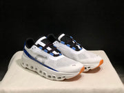 On Cloudmonster Sneakers in Mist White and Blue
