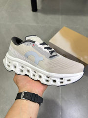 On Running Cloudmonster Sneakers in Gray and White