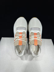 On Cloudnova 2 Sneakers in Ivory and Orange