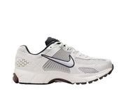Nike Vomero 5 Sneakers in Metallic Silver and White