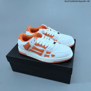 AMIRI Skeleton Low-Top Sneakers in White and Blue