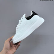 Alexander McQueen Oversized Low-Top Sneakers, White and Black