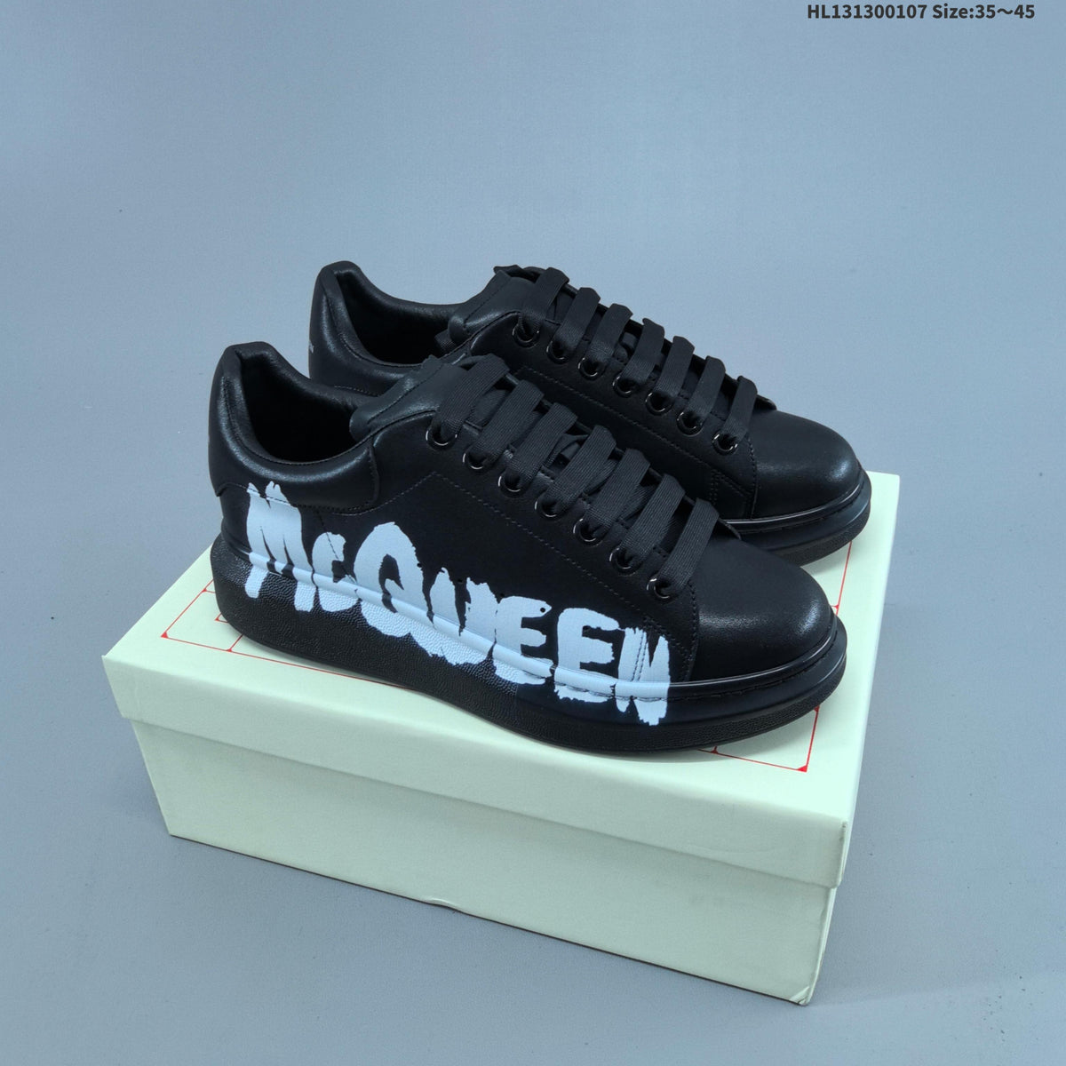 Alexander McQueen Oversized Sole Sneakers with Graphic Logo