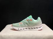 On Cloudsurfer Sneakers in Pale Green and White