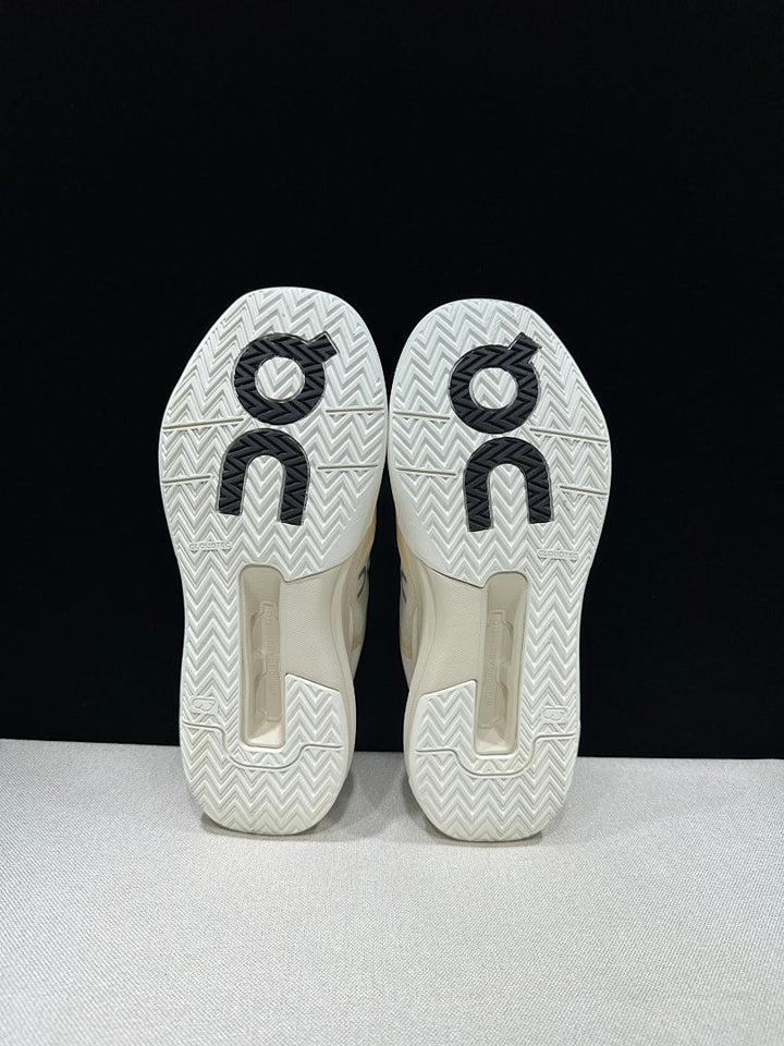 On The Roger Advantage Pro Sneakers in Cream and Black