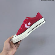 Converse Star Player Ox Low-Top Sneakers in Navy/White