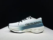 On Cloudboom Max Running Shoes in White and Lake Blue