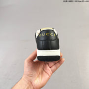 Gucci Screener Low-Top Sneakers in Black and White