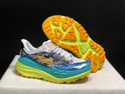 HOKA Stinson 7 Trail Sneakers in Blue and Lime
