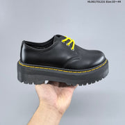 Dr. Martens 1460 Platform Lace-Up Boots in Black