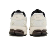 Nike Vomero 5 Sneakers in Metallic Silver and White