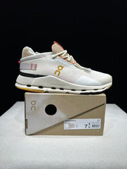 On Cloudnova 2 Sneakers in Ivory and Orange
