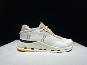 On Cloudnova 2 Sneakers in Ivory and Orange