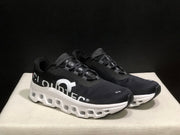 On Cloudmonster Black and White Running Sneakers