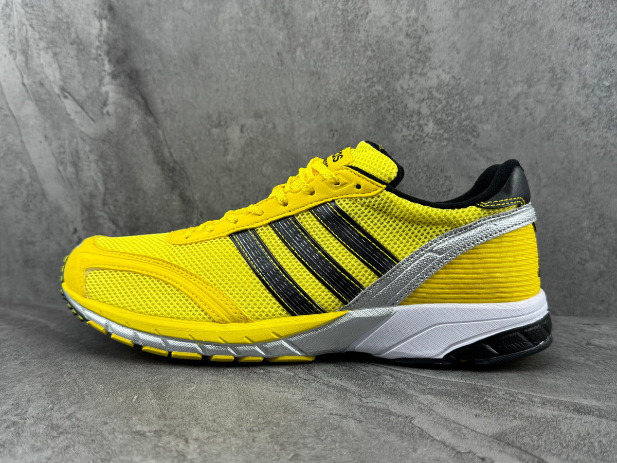 adidas Yellow Mesh Low-Top Sneakers with Three Stripes